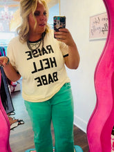 Load and play video in Gallery viewer, RAISIN' HELL GRAPHIC TEE
